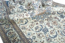 Surface texture of New Nain rug with natural Wool and intricate pattern
