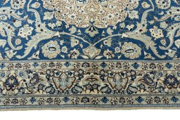 Corner detail of 1950s Nain rug showing border pattern and Cork pile