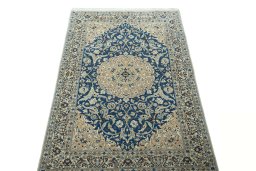 Surface texture of 1950s Nain rug with natural Cork and intricate pattern