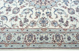 Corner detail of New Nain rug showing border pattern and Wool pile