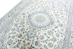 Backside of handmade 2000s Nain rug showing knot structure and weave density