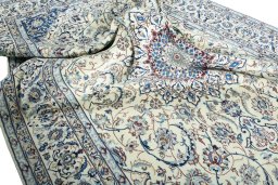 Surface texture of New Nain rug with natural Wool and intricate pattern