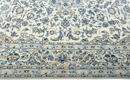 Corner detail of 2000s Nain rug showing border pattern and Wool pile