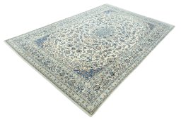 Corner detail of 2000s Nain rug showing border pattern and Wool pile
