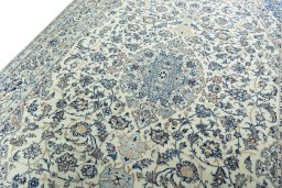 Backside of handmade 2000s Nain rug showing knot structure and weave density