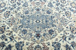Central medallion detail of 2000s Nain rug from Iran / Persia