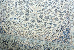 Close-up detail of 2000s Nain rug from Iran / Persia showing Wool weave