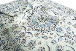 Surface texture of New Nain rug with natural Wool and intricate pattern