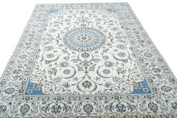 Surface texture of New Nain rug with natural Wool and intricate pattern