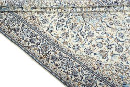 Close-up detail of 2000s Nain rug from Iran / Persia showing Wool weave