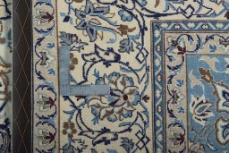 Backside of handmade 2000s Nain rug showing knot structure and weave density