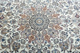 Central medallion detail of 2000s Nain rug from Iran / Persia