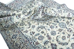 Surface texture of New Nain rug with natural Wool and intricate pattern