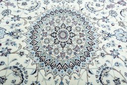 Central medallion detail of New Nain rug from Iran / Persia