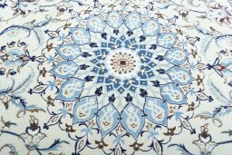 Central medallion detail of New Nain rug from Iran / Persia