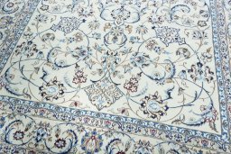 Close-up detail of New Nain rug from Iran / Persia showing Wool weave