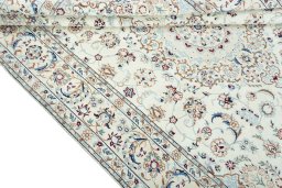 Close-up detail of 2000s Nain rug from Iran / Persia showing Wool weave