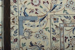 Backside of handmade 2000s Nain rug showing knot structure and weave density