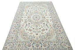Surface texture of 2000s Nain rug with natural Wool and intricate pattern