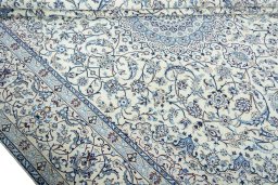 Close-up detail of 2000s Nain rug from Iran / Persia showing Wool weave