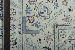 Backside of handmade 2000s Nain rug showing knot structure and weave density