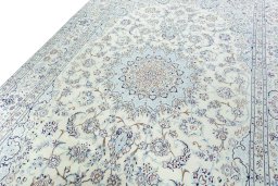Backside of handmade 2000s Nain rug showing knot structure and weave density