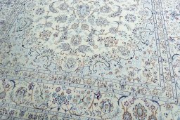 Close-up detail of 2000s Nain rug from Iran / Persia showing Wool weave