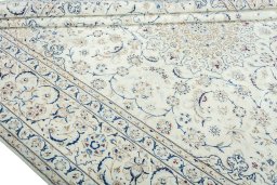 Close-up detail of 2000s Nain rug from Iran / Persia showing Wool weave