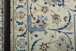 Backside of handmade 2000s Nain rug showing knot structure and weave density