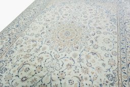 Backside of handmade 2000s Nain rug showing knot structure and weave density