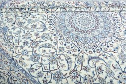 Close-up detail of New Nain rug from Iran / Persia showing Wool weave