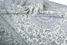 Surface texture of New Nain rug with natural Wool and intricate pattern