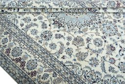 Close-up detail of 2000s Nain rug from Iran / Persia showing Wool weave