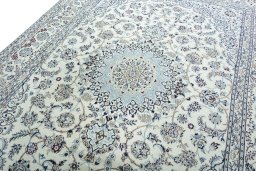 Backside of handmade 2000s Nain rug showing knot structure and weave density