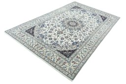 Corner detail of New Nain rug showing border pattern and Cork pile