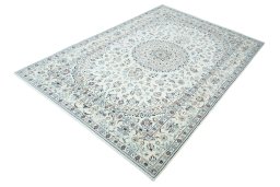 Corner detail of 2000s Nain rug showing border pattern and Wool pile