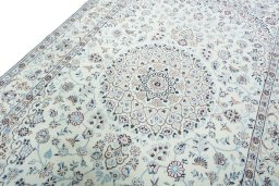 Backside of handmade 2000s Nain rug showing knot structure and weave density