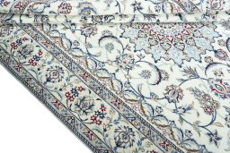 Close-up detail of 2000s Nain rug from Iran / Persia showing Wool weave