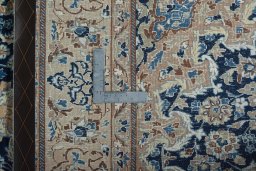 Backside of handmade 2000s Nain rug showing knot structure and weave density