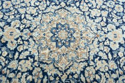 Central medallion detail of 2000s Nain rug from Iran / Persia