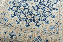 Close-up detail of 2000s Nain rug from Iran / Persia showing Wool weave