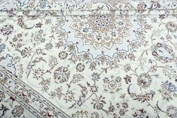 Close-up detail of New Nain rug from Iran / Persia showing Wool weave