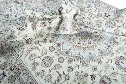 Surface texture of New Nain rug with natural Wool and intricate pattern