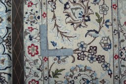 Close-up detail of New Nain rug from Iran / Persia showing Wool weave
