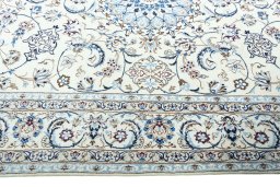 Close-up detail of New Nain rug from Iran / Persia showing Wool weave