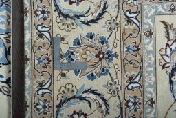 Central medallion detail of New Nain rug from Iran / Persia