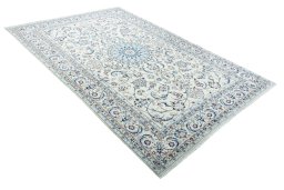 Surface texture of New Nain rug with natural Wool and intricate pattern