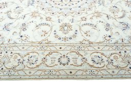 Corner detail of New Nain rug showing border pattern and Wool pile