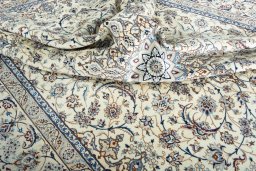 Surface texture of New Nain rug with natural Wool and intricate pattern