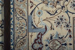Backside of handmade New Nain rug showing knot structure and weave density